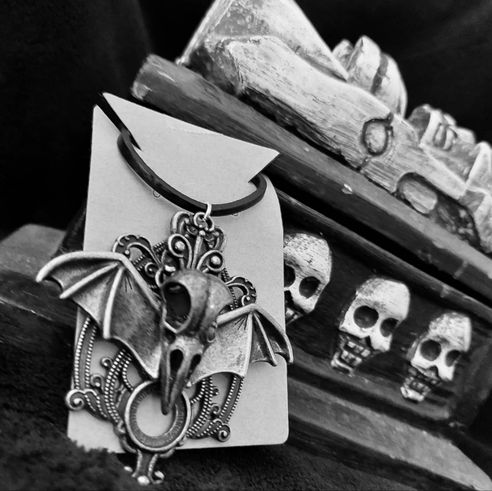 SUEDE cord crow/bat skull necklace